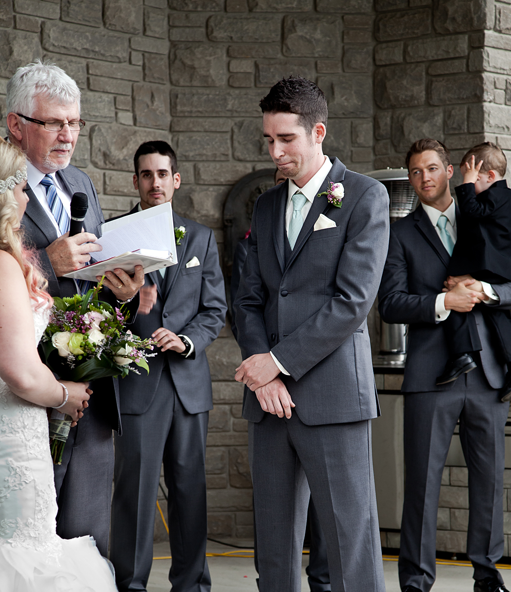 The handsome groom in a serious moment